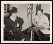 Photograph of Congresswoman Jane Pratt meeting with Brigadier General Pearson Menoher, Commander, Fort Bragg